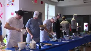 Giving back: Darien football players make pies for first responders, teachers and food pantry