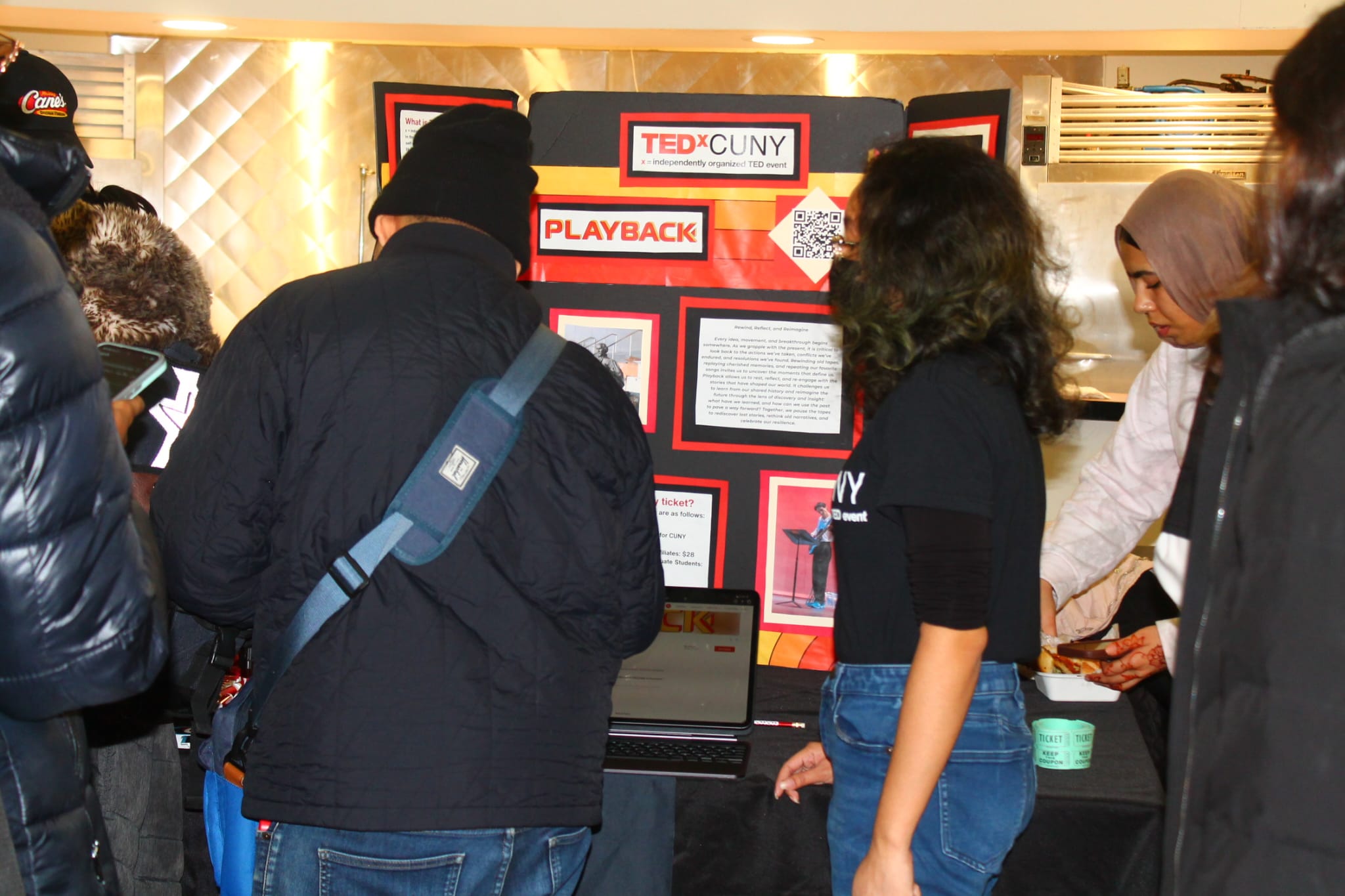 students around poster board 