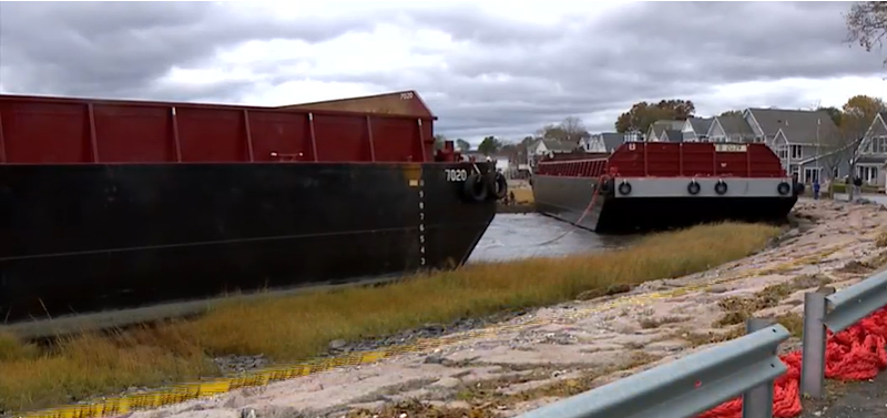 Story image: Barges stuck in West Haven successfully towed away