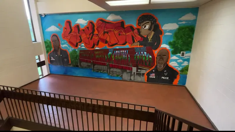 Story image: Mural by Shelton HS senior honors officers who positively impacted his life