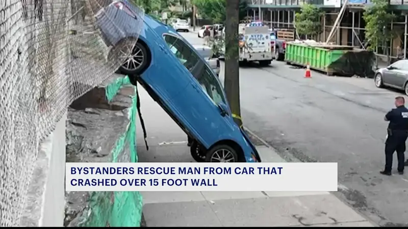 Story image: Good Samaritans rescue driver after car plunges over 10-foot wall in Allerton