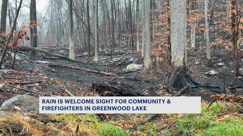 Story image: Greenwood Lake wildfire nearly extinguished, residents turn attention to charred debris