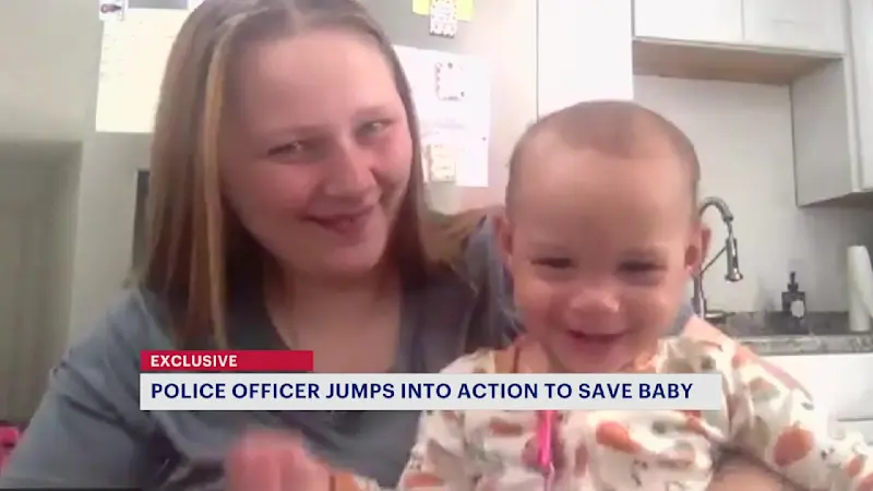 Story image: Exclusive: Police bodycam shows officer saving choking baby in Walden