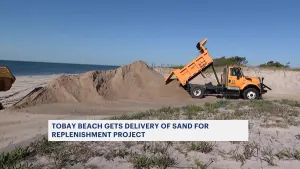 Sand delivered to Tobay Beach, crews work on opening access to the beach