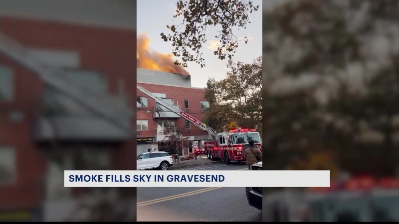 Story image: Smoke billows from 2-alarm fire in Gravesend mixed-use building