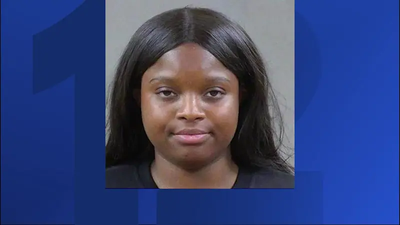 Story image: Woman accused of biting, kicking and spitting at officers in Wayne