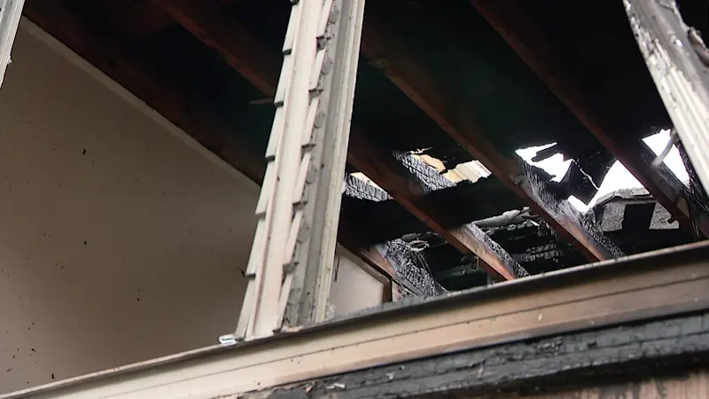 Story image: Firefighter seriously injured after falling through roof in Roslyn Heights house fire