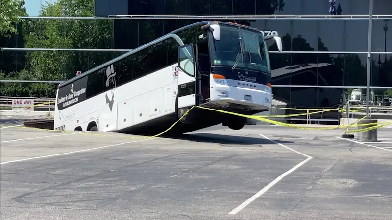 Story image: North New Hyde Park parking garage remains closed after bus partially collapsed through it
