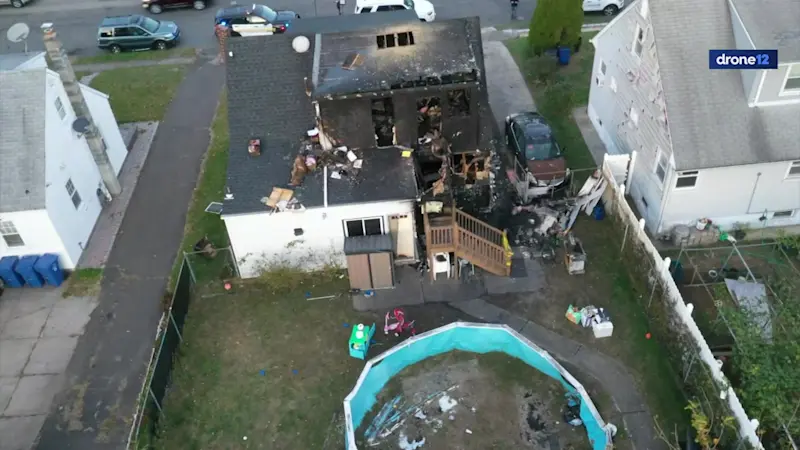 Story image: Family, including 3 children, killed in Paterson house fire
