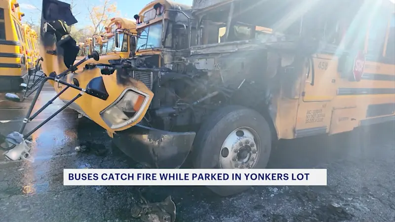 Story image: 2 school buses ignite in flames in Yonkers lot