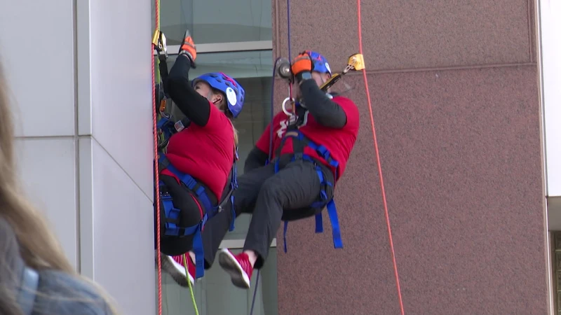 Story image: Over the edge: Urban rappelling event raises money for Wakeman Boys & Girls Club