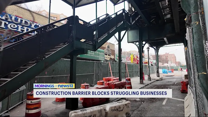 Story image: Broadway businesses cite slow foot traffic since construction barrier installed 