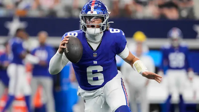Story image: Giants QB Jaxson Dart is done for the regular season with a knee injury, coach John Harbaugh says