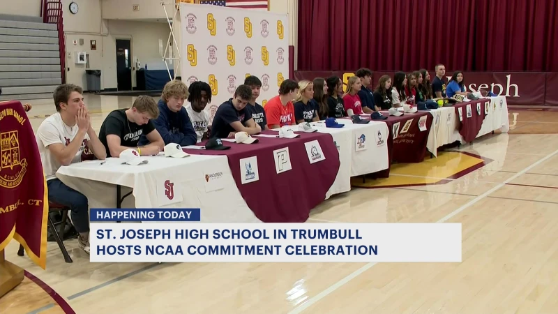 Story image: Athletes from St. Joseph High School celebrate NCAA national signing day