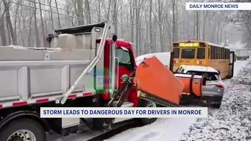 Story image: Caught on camera: School bus and town plow crash in Monroe storm pileup