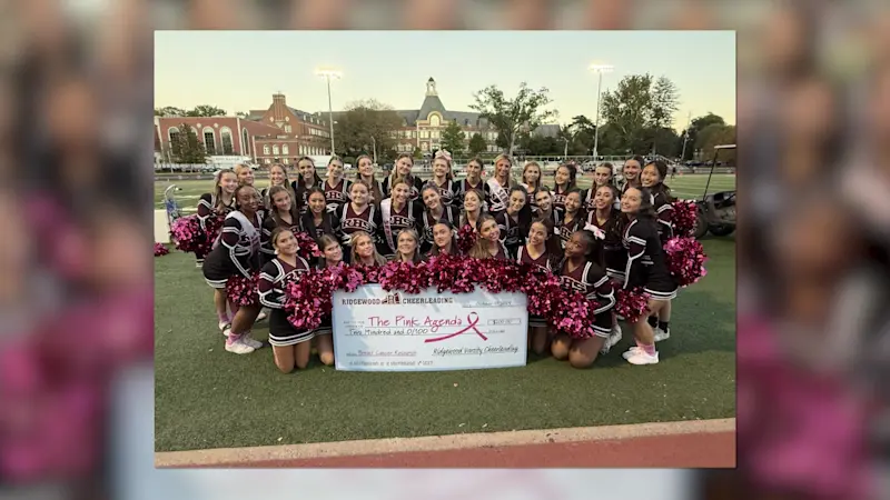Story image: Ridgewood high school cheerleaders help raise money for breast cancer