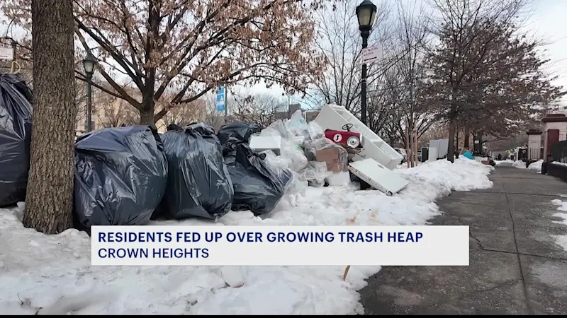 Story image: Uncollected trash piles growing by the day in Crown Heights along Eastern Parkway