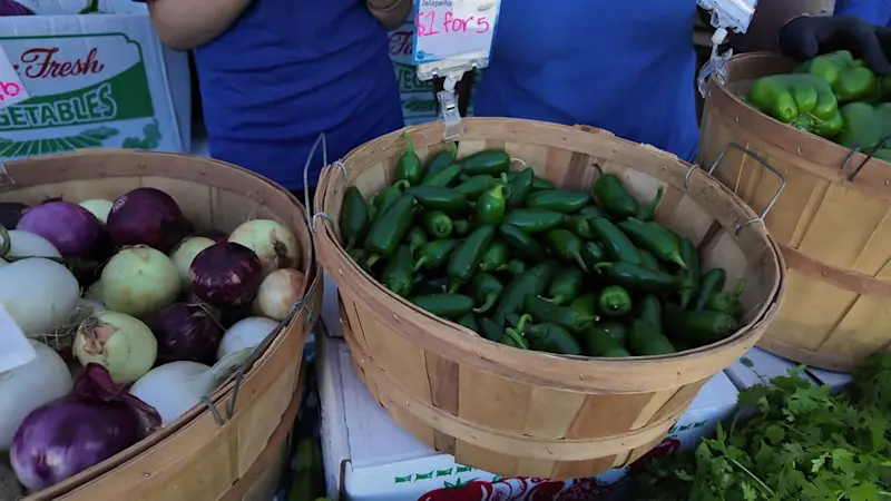 Story image: Shoppers turn to local produce markets amid diarrhea-causing parasite
