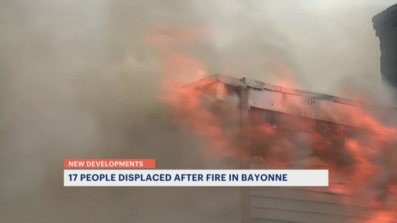 Story image: Officials: 5-alarm fire forces evacuation of Bayonne day care; 17 residents displaced