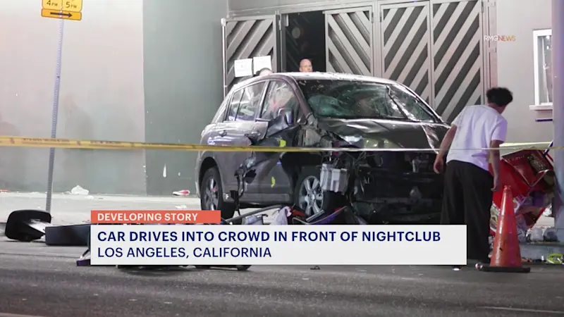 Story image: Man whose car struck crowd outside Los Angeles club, injuring 30, was shot, attacked by crowd