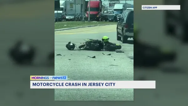 Motorcycle crashes in Jersey City near Communipaw intersection 