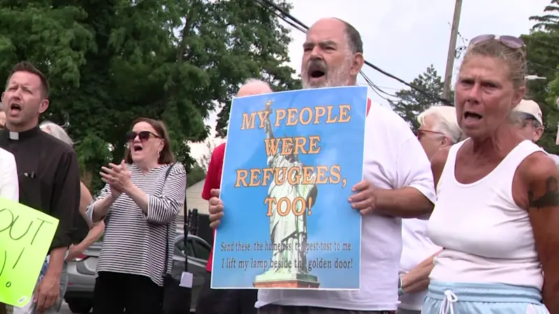 Story image: Community gathers for interfaith vigil in support of deported migrants
