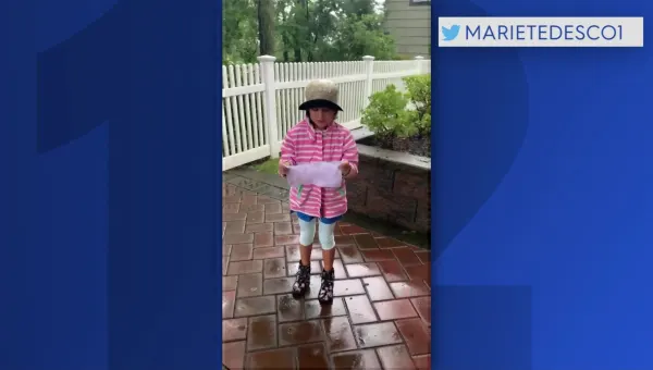 Budding weather reporter sends in weather report on Henri from Eastchester