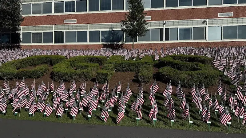 Story image: Jersey Proud: Cedar Grove High School 9/11 flag memorial