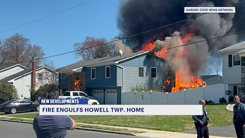 Story image: Off-duty Rahway police officer and family escape multi-alarm house fire in Howell