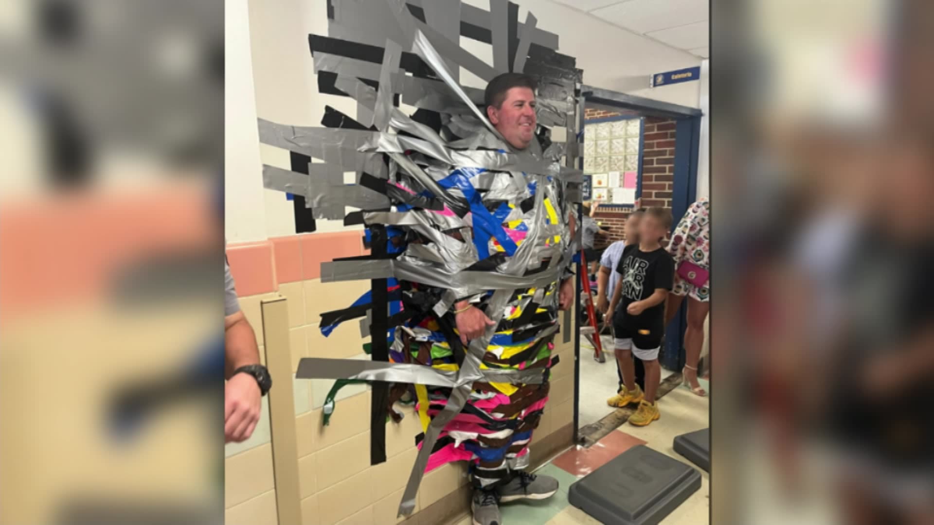 New Jersey students pay $1 to tape their teacher to a wall