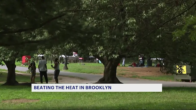 Story image: Brooklyn residents head to Prospect Park to beat the heat