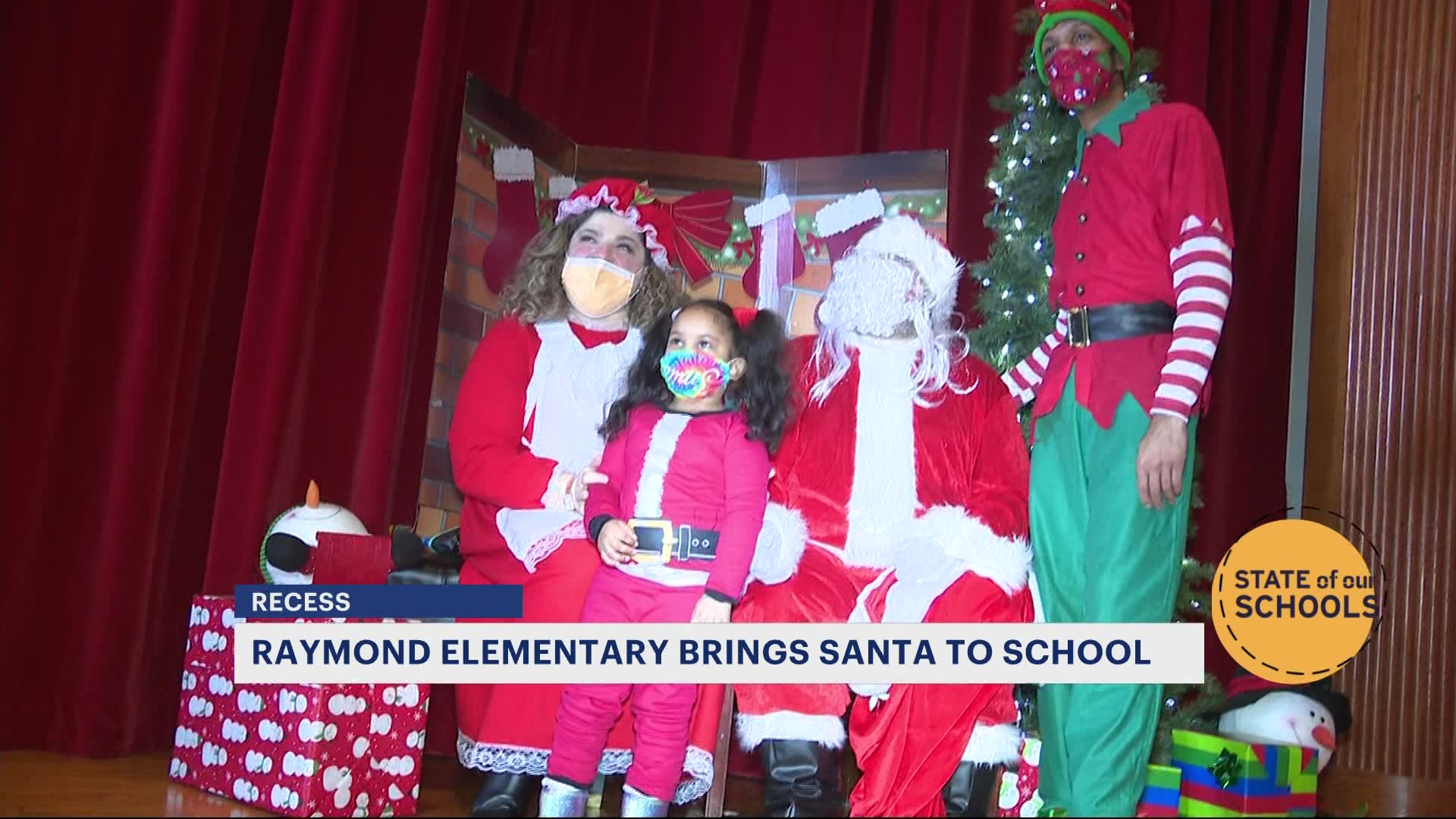 St Raymond Elementary School students take pictures with Santa St Raymond Elementary School students take pictures with Santa