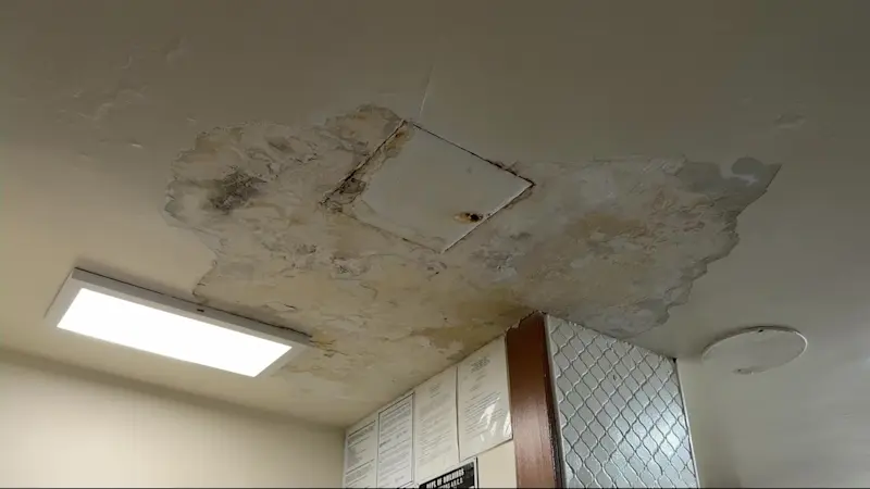 Story image: Ongoing leak leaves mail and packages wet inside Kensington building