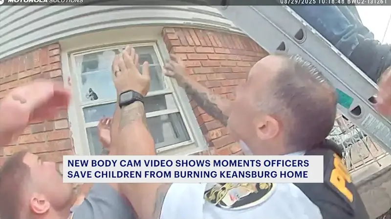 Story image: New body cam video shows moments officers save children from burning Keansburg home