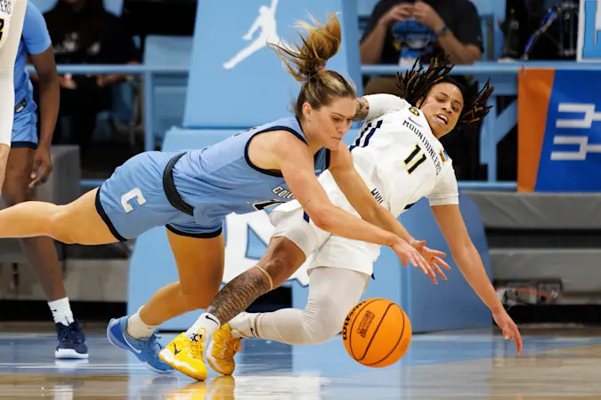 Story image: Qunierly's 27 points lifts No. 6 West Virginia to 78-59 win over 11th-seed Columbia