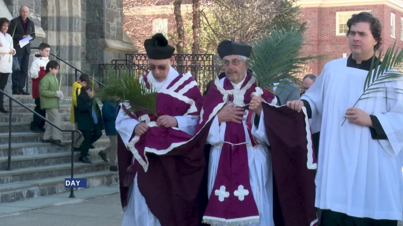 Story image: Parishioners gather for Palm Sunday services at St. Mary’s in Norwalk