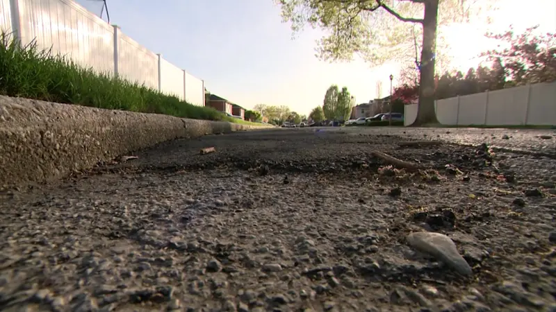 Story image: Westbury residents demand road repairs after years of problems