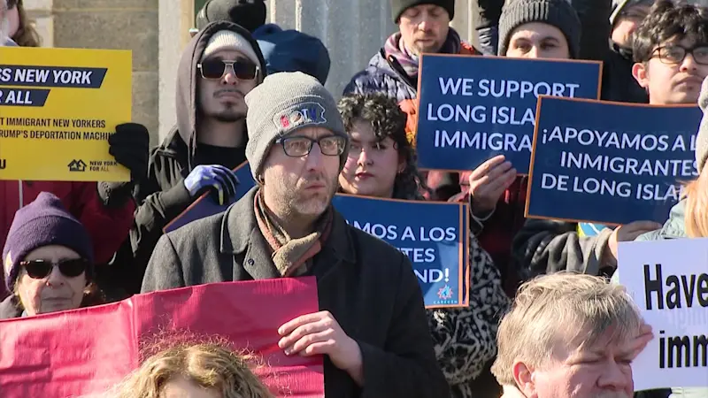 Story image: Protesters rally against Nassau’s collaboration with ICE