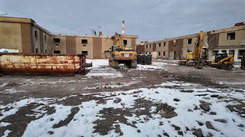 Story image: Crews begin to demolish former Island Park motel to make way for apartment building