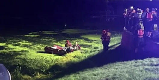 Car in Piscataway pond