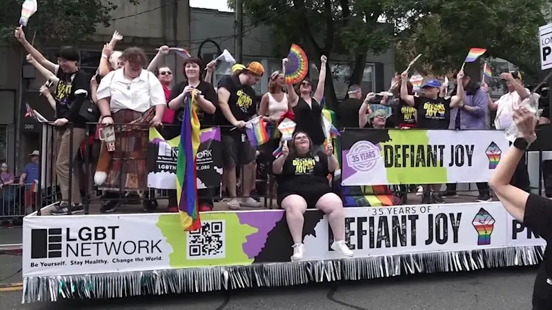 Story image: ‘Anything but silent.’ Pride Parade in Huntington embraces ‘defiant joy’