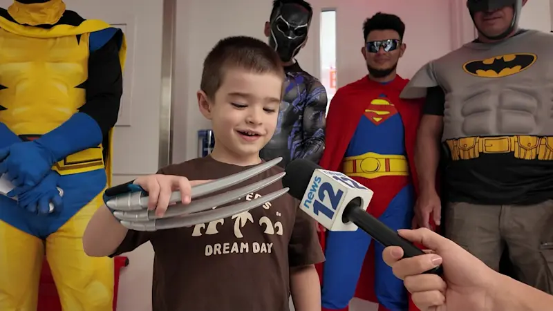 Story image: Window washers dressed as superheroes surprise pediatric patients at Maimonides Hospital