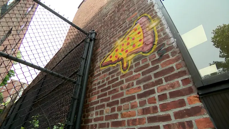 Story image: Pizza-themed graffiti artist finally caught after years of eluding police