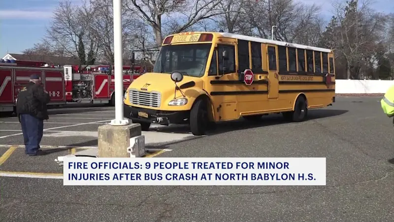 Story image: North Babylon High School bus on way to track meet crashes, at least 9 people injured