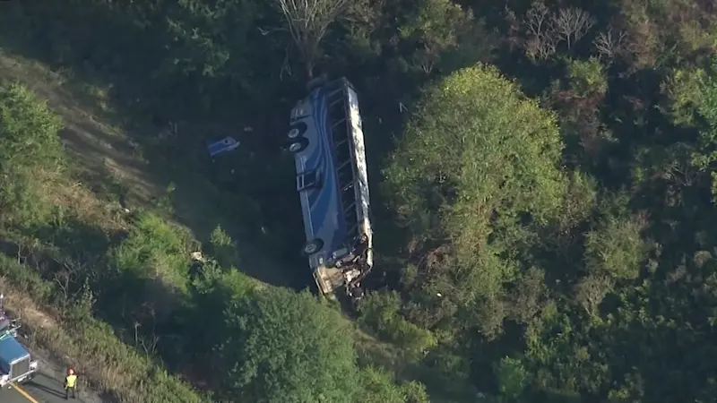 Story image: NTSB: Tire failure caused fatal 2023 crash of bus carrying Farmingdale students in Orange County