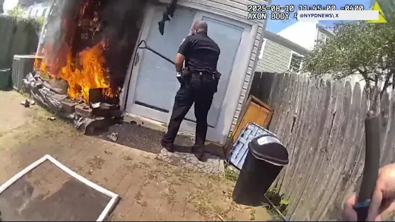 Story image: Caught on camera: NYPD officers save Coney Island brothers from fire