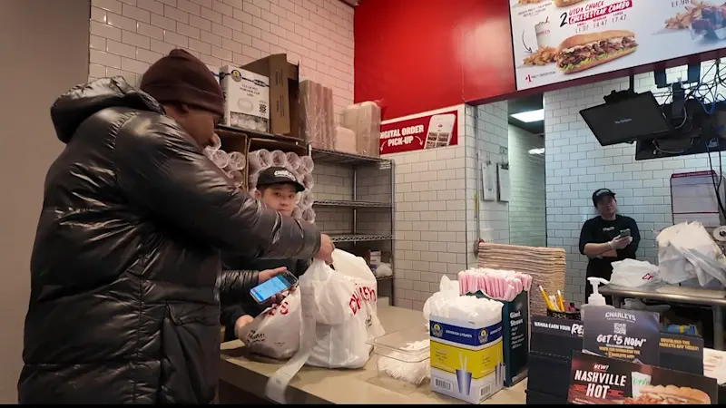 Story image: New NYC tipping law takes effect as delivery drivers brave extreme winter weather