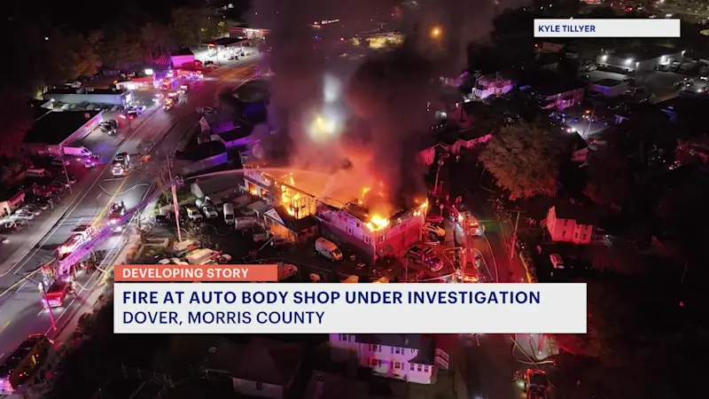 Story image: Fire reignites at Dover auto shop owned by mayor