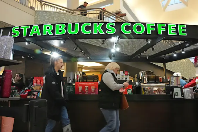 Story image: Starbucks to close stores, lay off 900 workers as part of turnaround plan