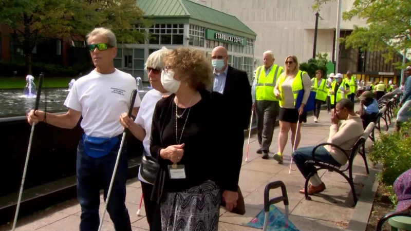 Story image: Advocates honor National White Cane Awareness Day with a new pedestrian signal in Sleepy Hollow